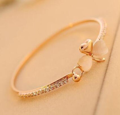 Korean fashion clover cat's eye bracelet full diamond bracelet exquisite versatile hand jewelry